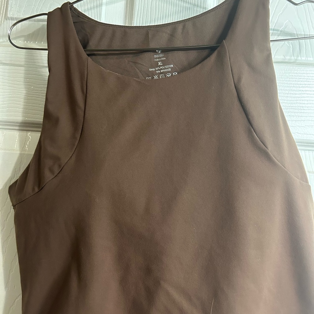 High neck, long line workout tank with shelf bra.
